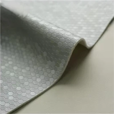 Tehase hulgimüük kunstmaterjalist kangast reljeefne PVC sünteetiline nahk kottide jaoks